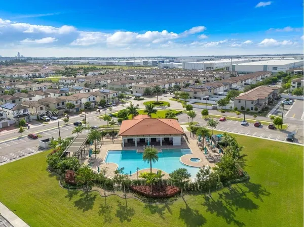 a view of a lake with a city