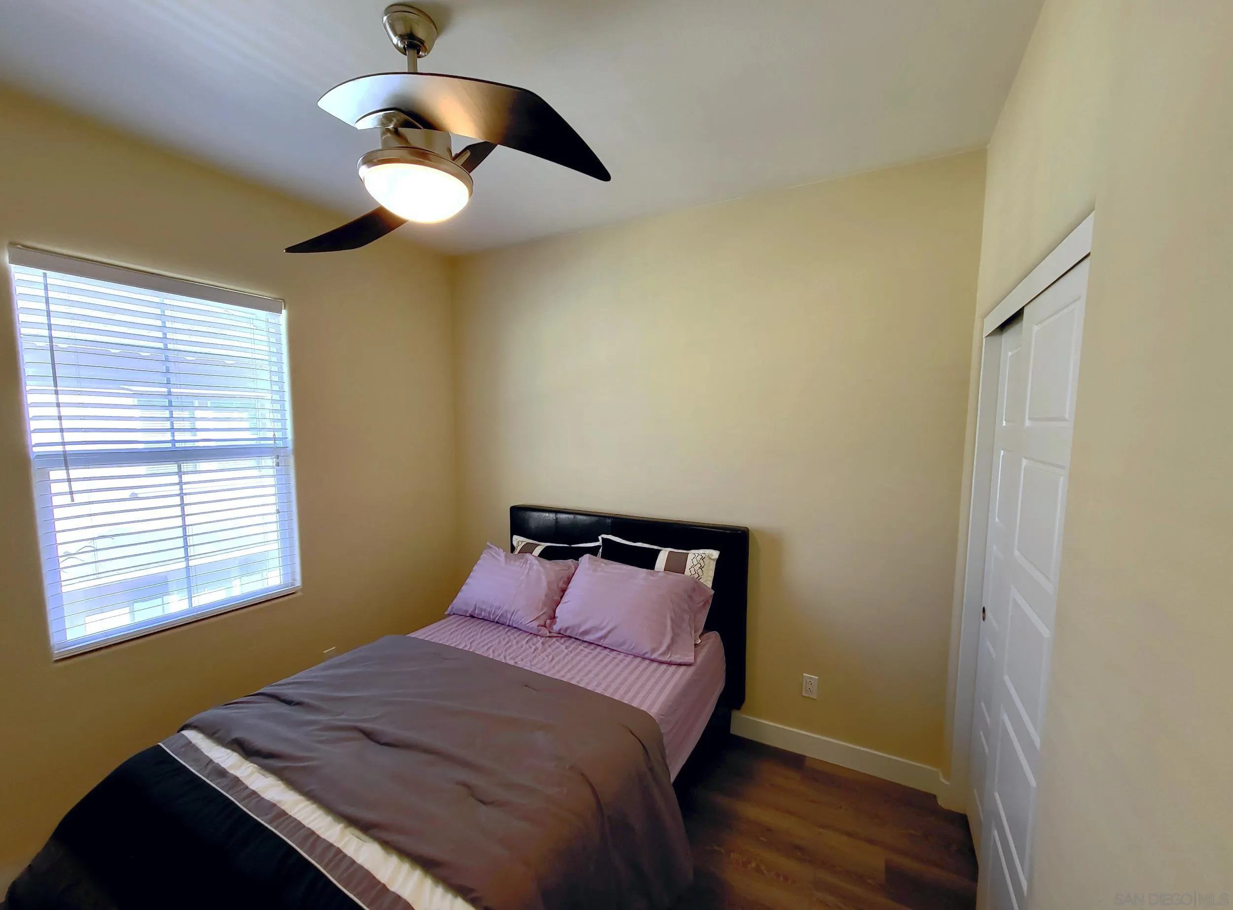 2152 Cosmo Way San Marcos, CA 92078 - Photo 13 of 28 a bedroom with a bed and a window