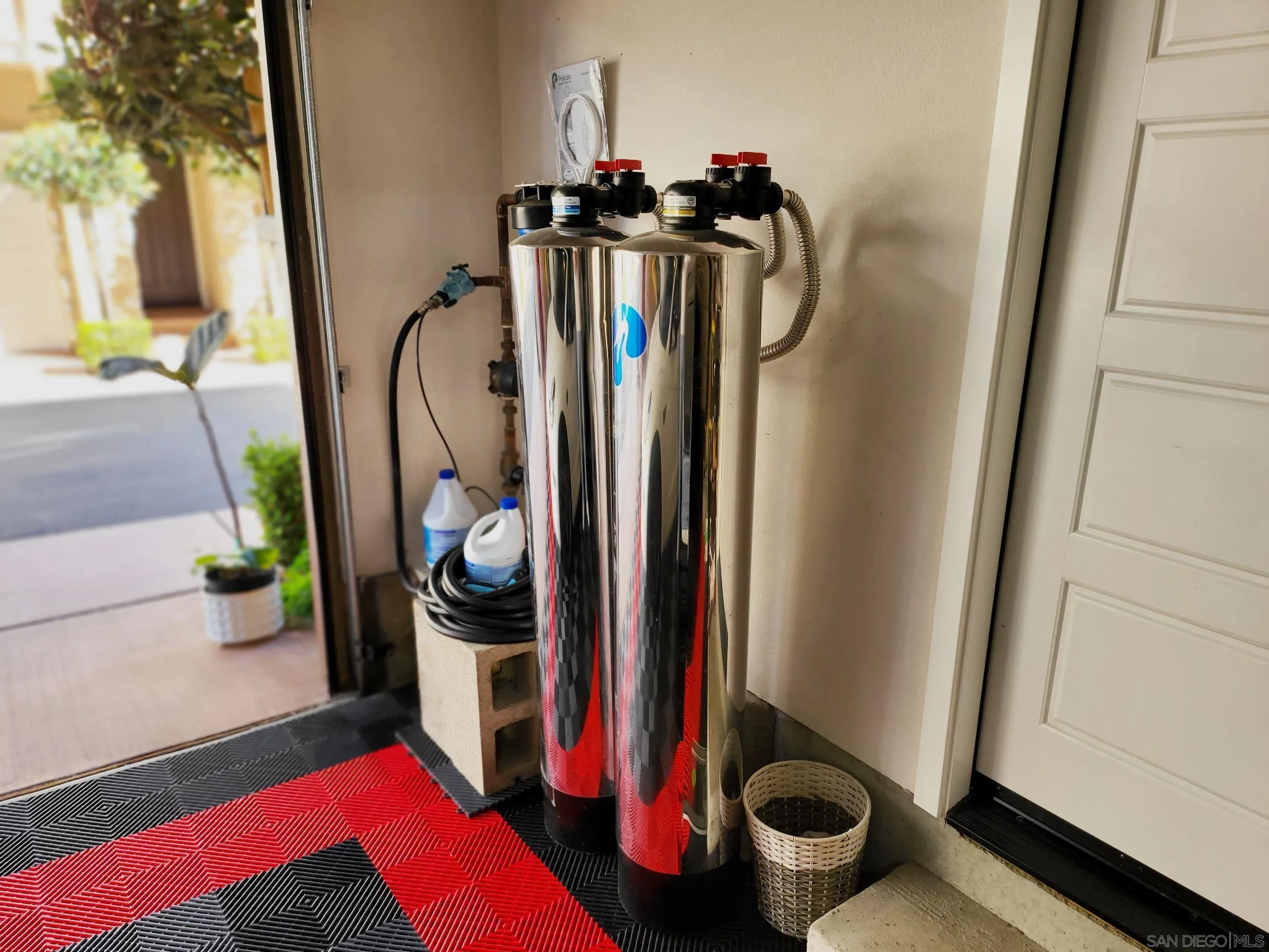 2152 Cosmo Way San Marcos, CA 92078 - Photo 18 of 28 a view of walk in closet with clothes and shoes