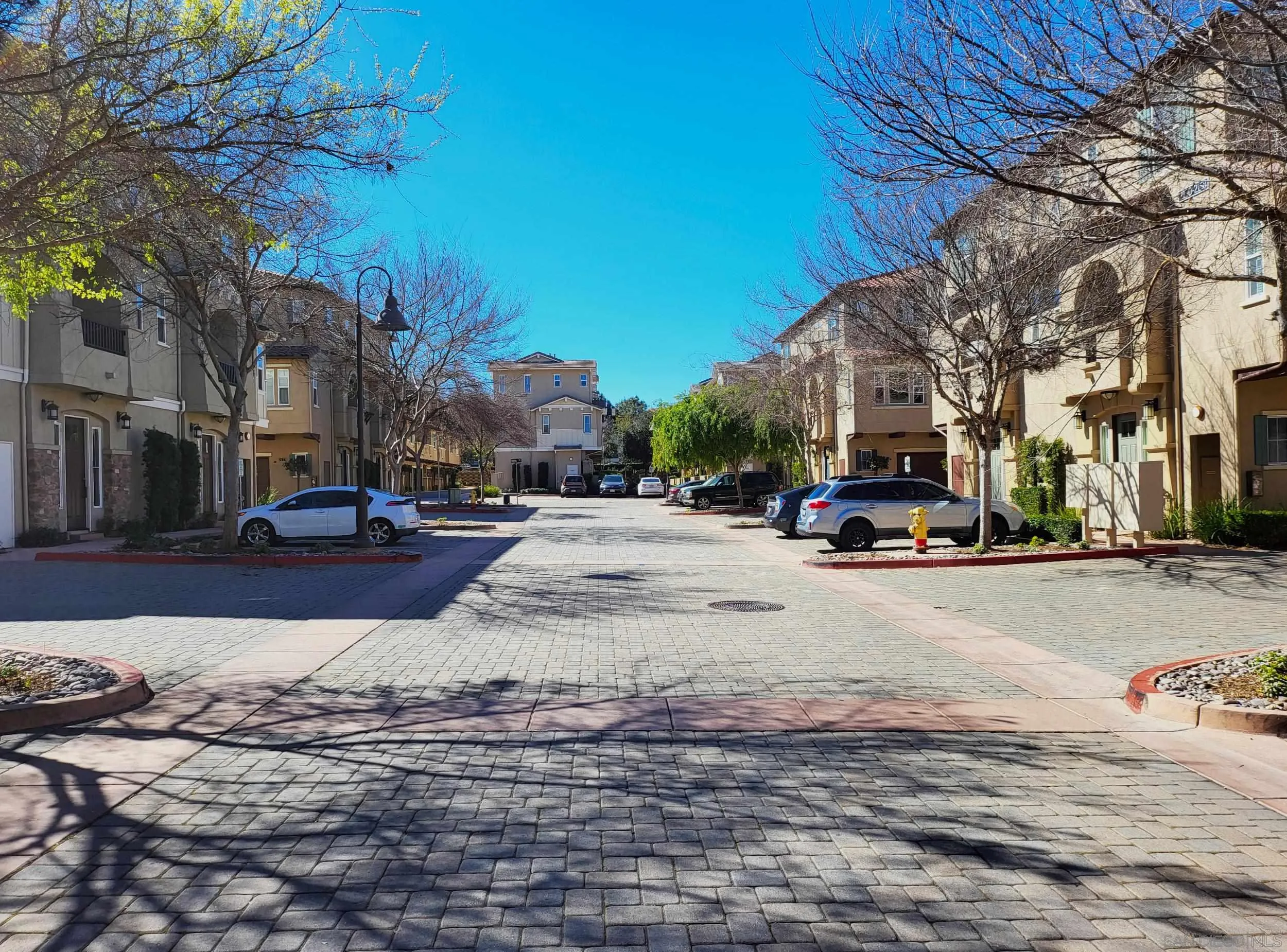 2152 Cosmo Way San Marcos, CA 92078 - Photo 22 of 28 a car parked on the side of a street
