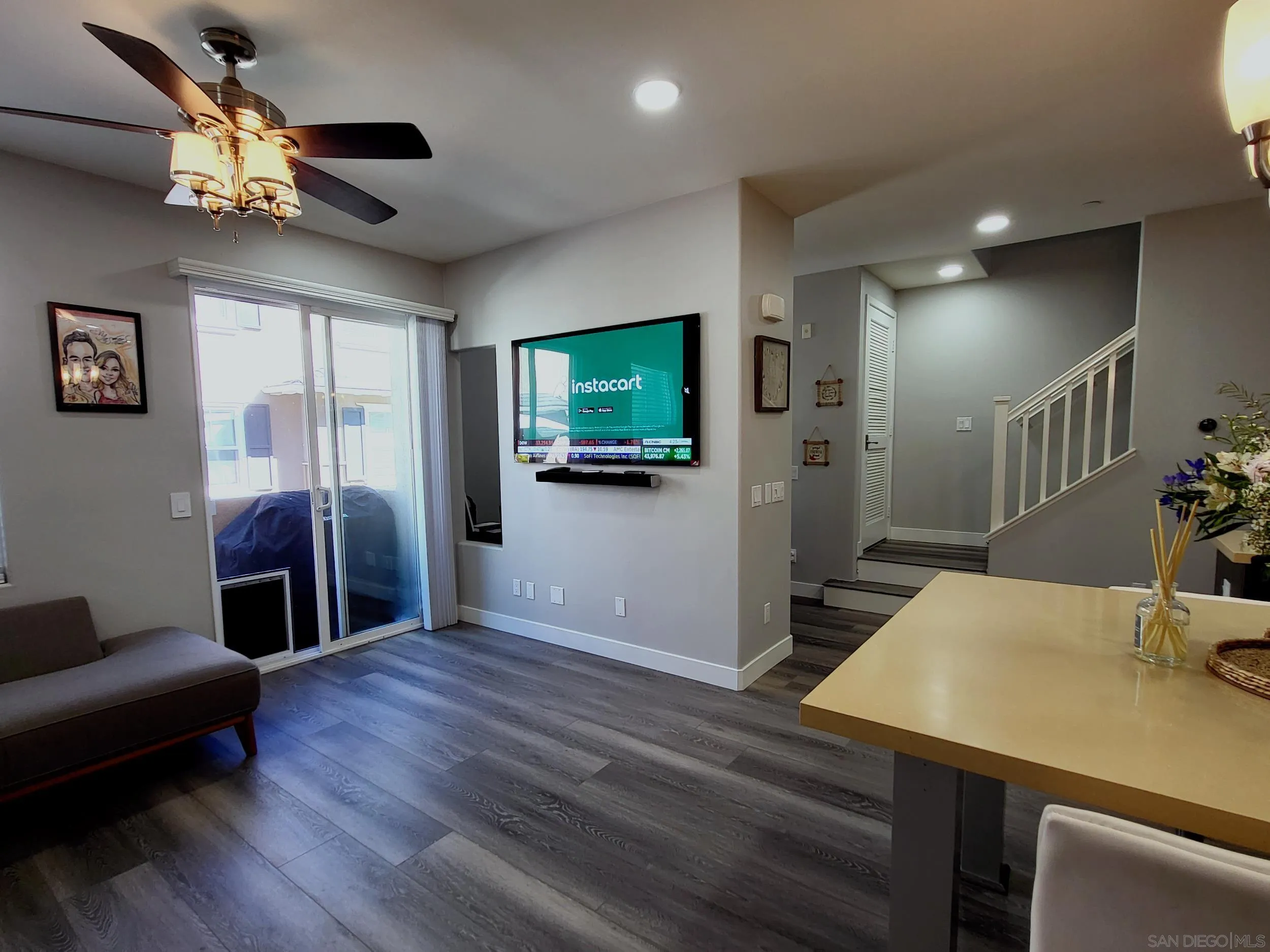 2152 Cosmo Way San Marcos, CA 92078 - Photo 4 of 28 a living room with furniture and a flat screen tv