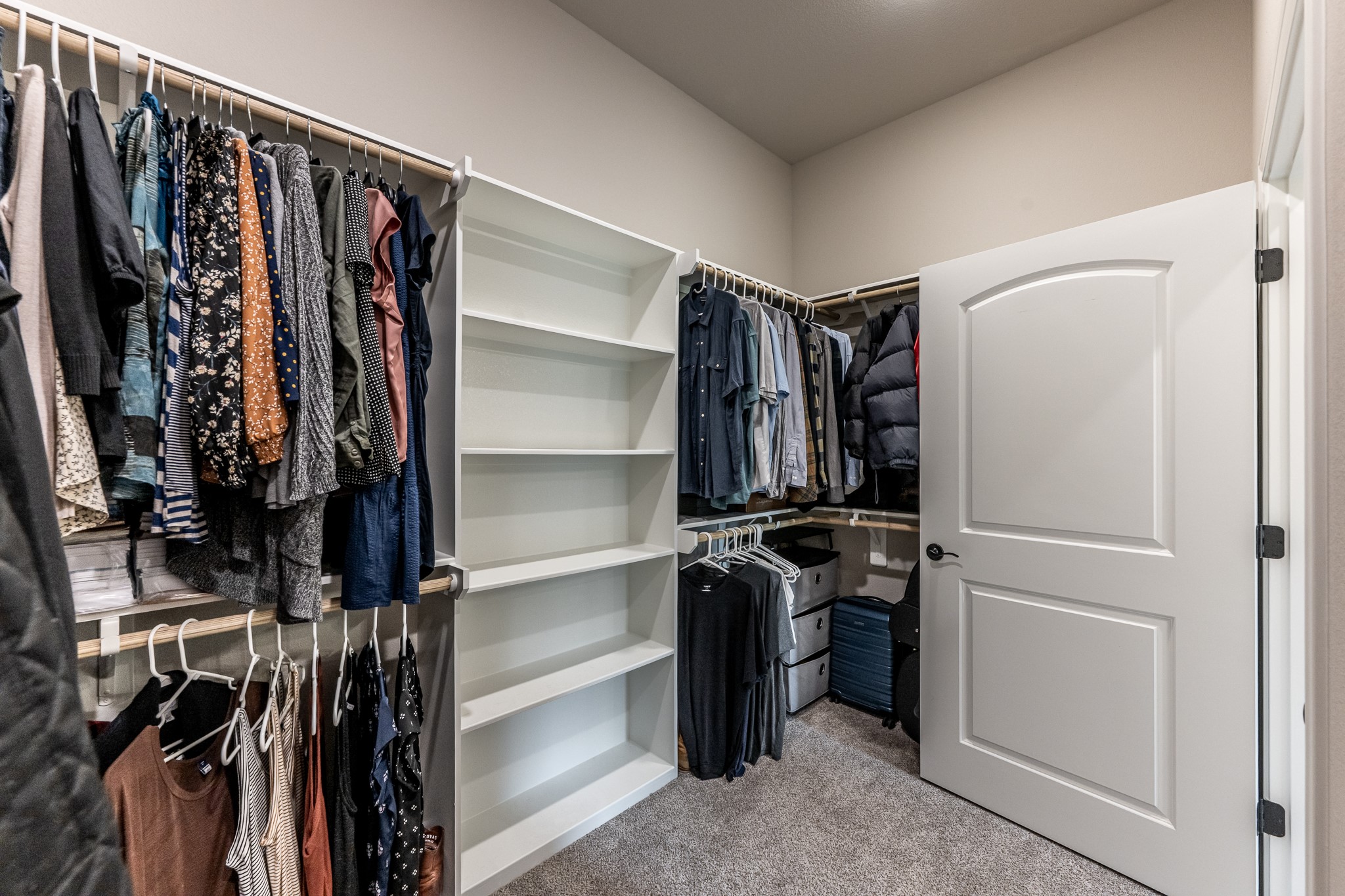 111 Eagle Run Road Willis, TX 77378 - Photo 22 of 44 Spacious walk-in closet with a dedicated desk area for added convenience.