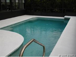 520 Sandpiper Court Edgewater, FL 32141 - Photo 2 of 7 a backyard of a house