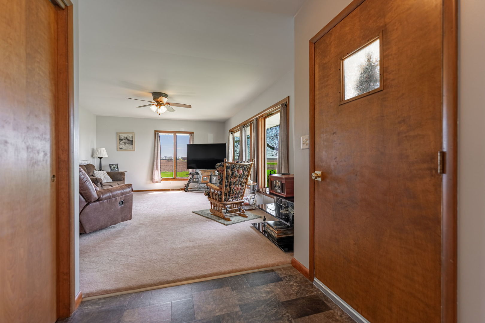 1989 Mowers Road Esmond, IL 60129 - Photo 6 of 54 a view of a livingroom with furniture and a window