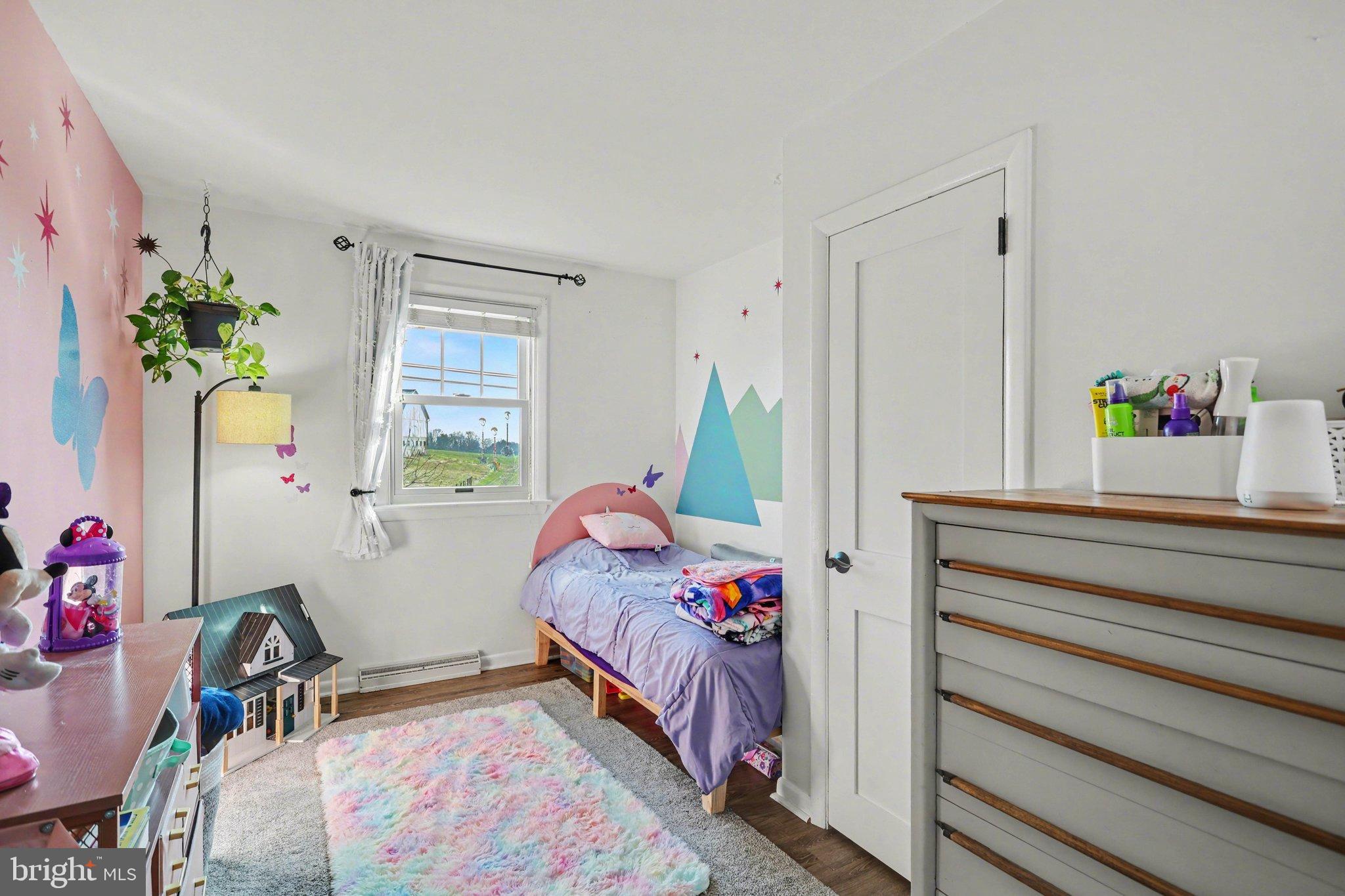 2848 Kissel Hill Road Lancaster, PA 17601 - Photo 11 of 36 a bedroom with a bed and a window