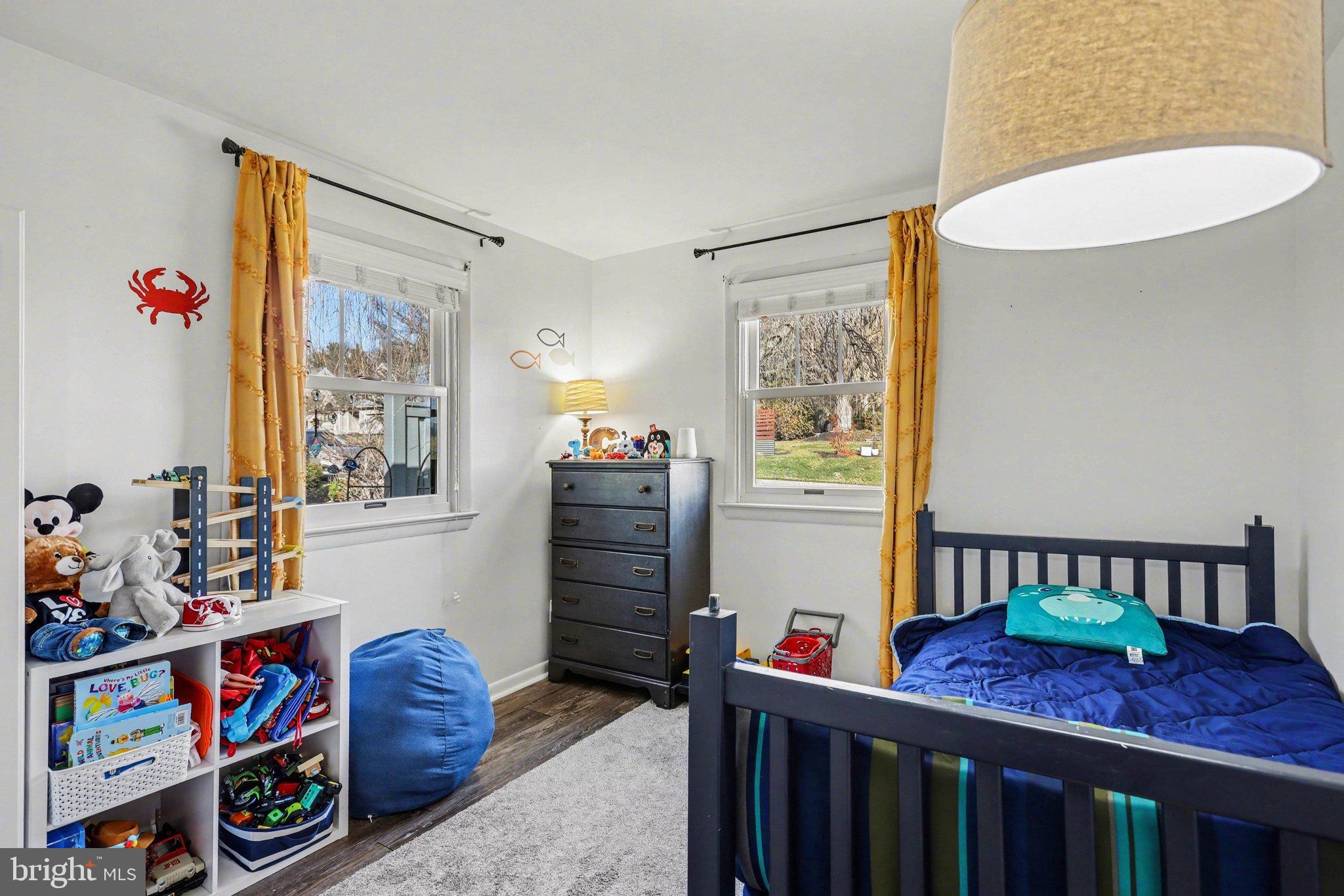 2848 Kissel Hill Road Lancaster, PA 17601 - Photo 13 of 36 a bedroom with a bed and wooden floor