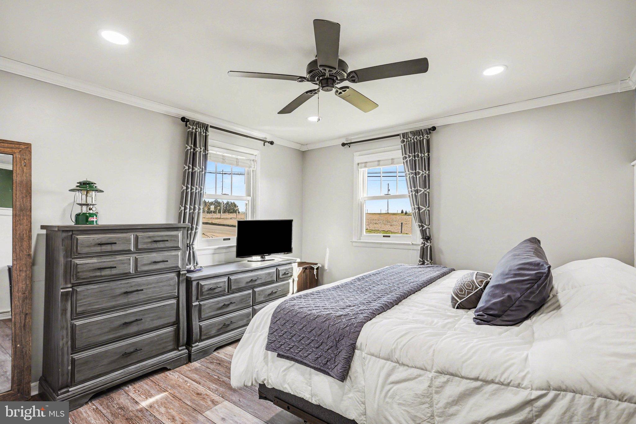 2848 Kissel Hill Road Lancaster, PA 17601 - Photo 15 of 36 a bedroom with a bed and a flat screen tv