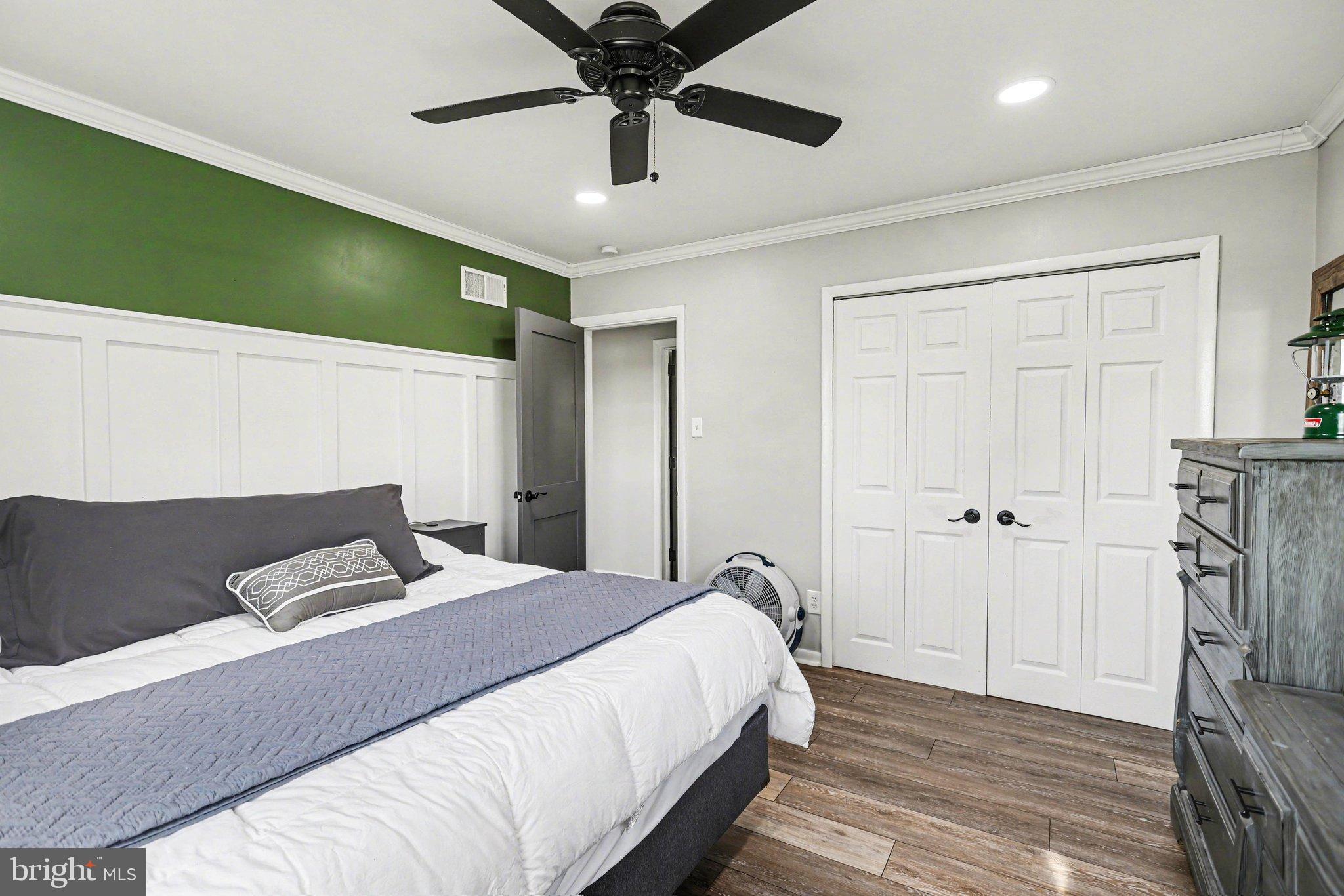 2848 Kissel Hill Road Lancaster, PA 17601 - Photo 16 of 36 a bedroom with a bed and wooden floor