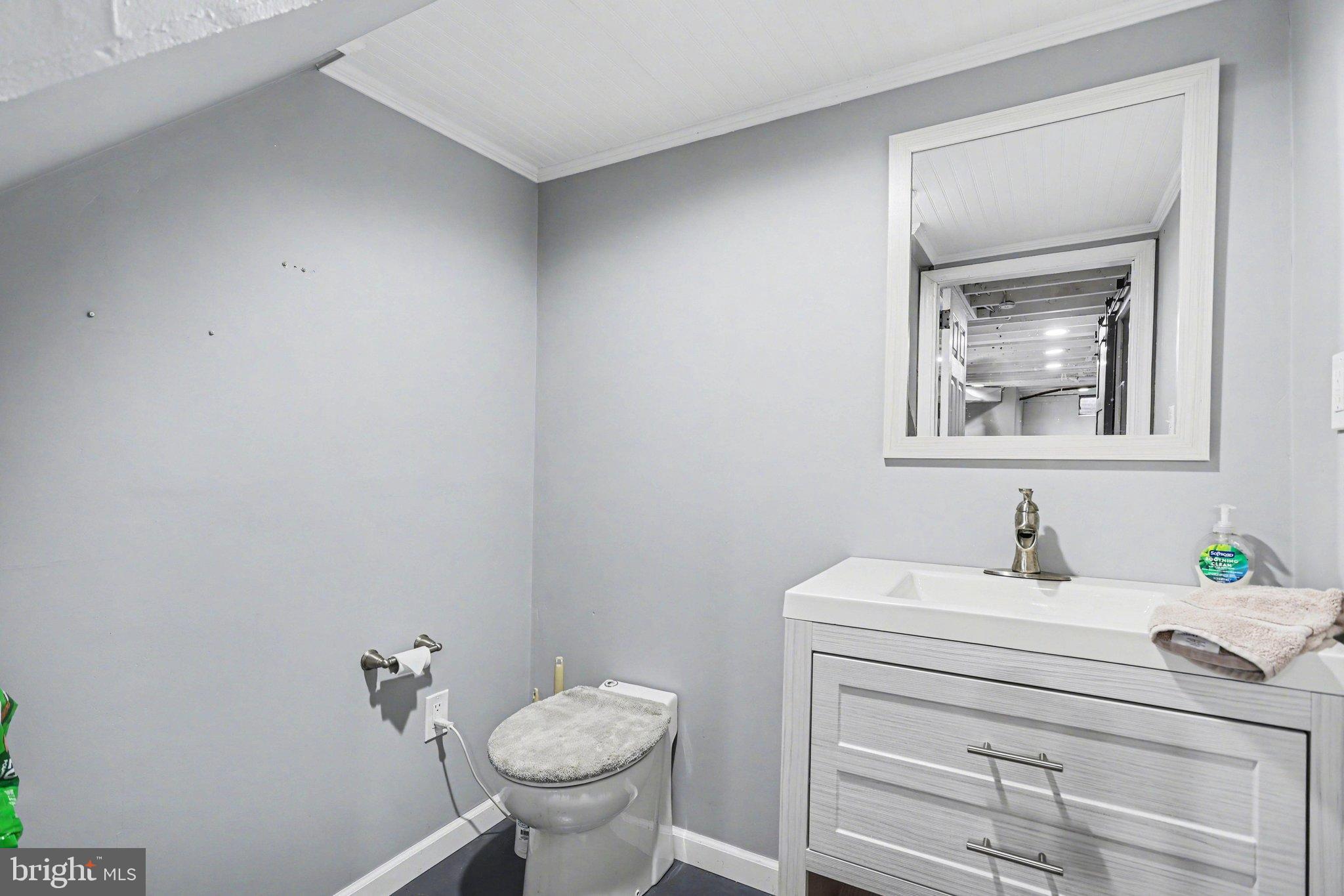 2848 Kissel Hill Road Lancaster, PA 17601 - Photo 19 of 36 a bathroom with a sink toilet and vanity