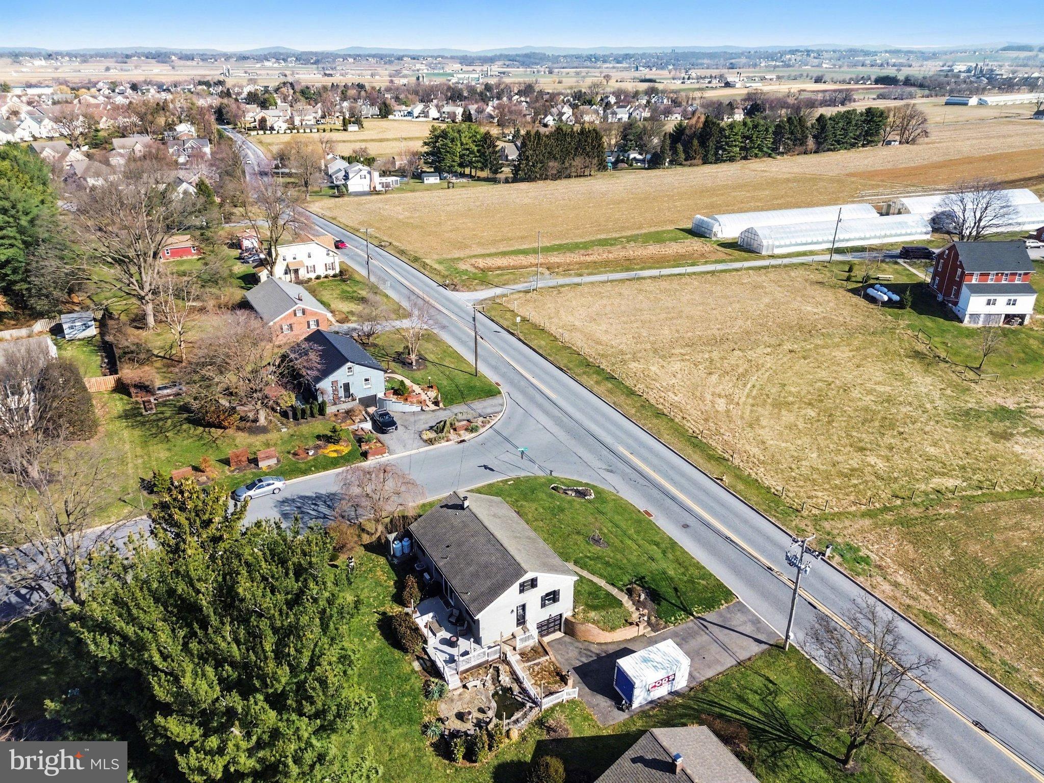 2848 Kissel Hill Road Lancaster, PA 17601 - Photo 35 of 36 an aerial view of a house with a lake