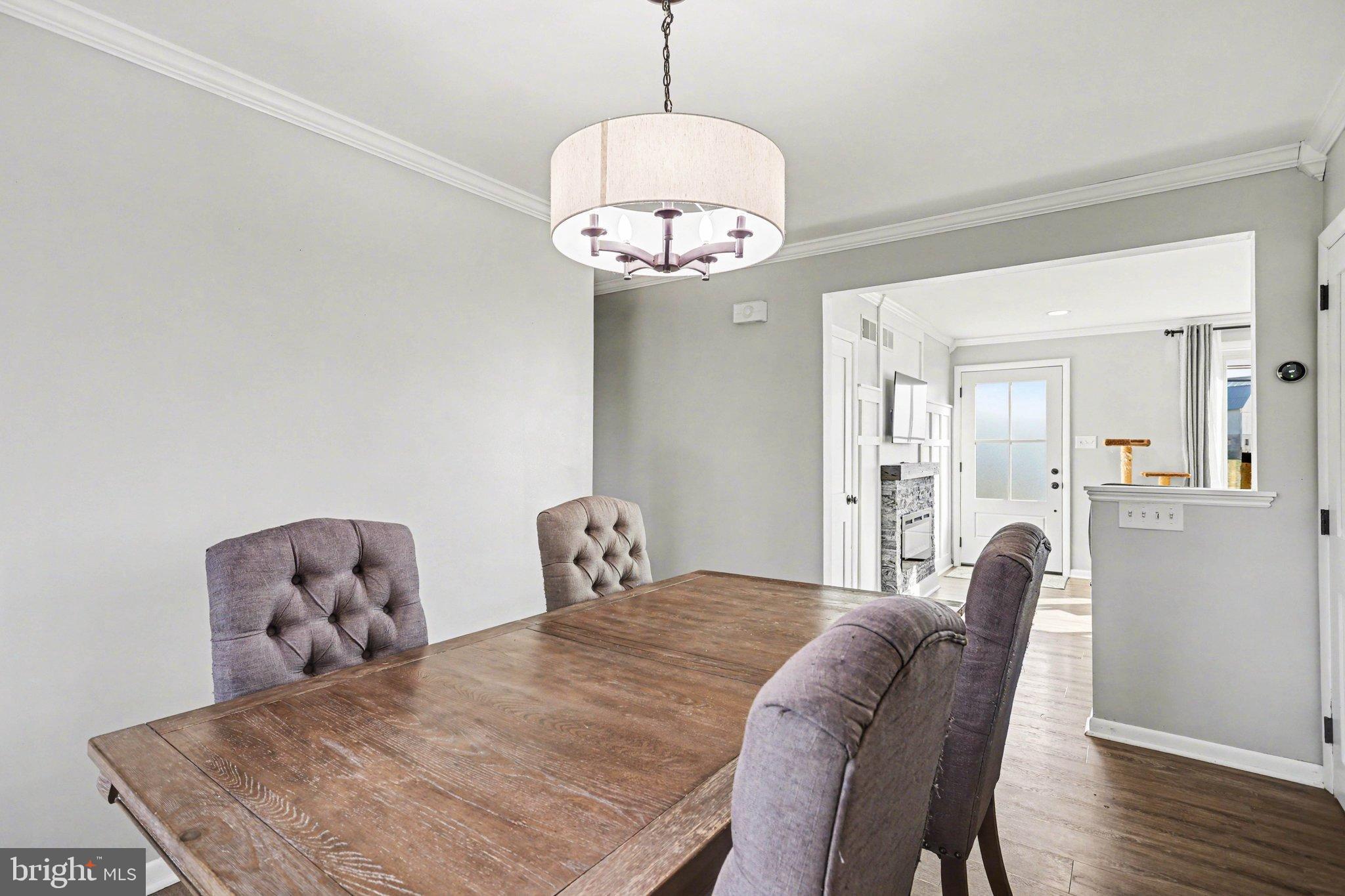 2848 Kissel Hill Road Lancaster, PA 17601 - Photo 6 of 36 a view of a dining room with furniture and wooden floor