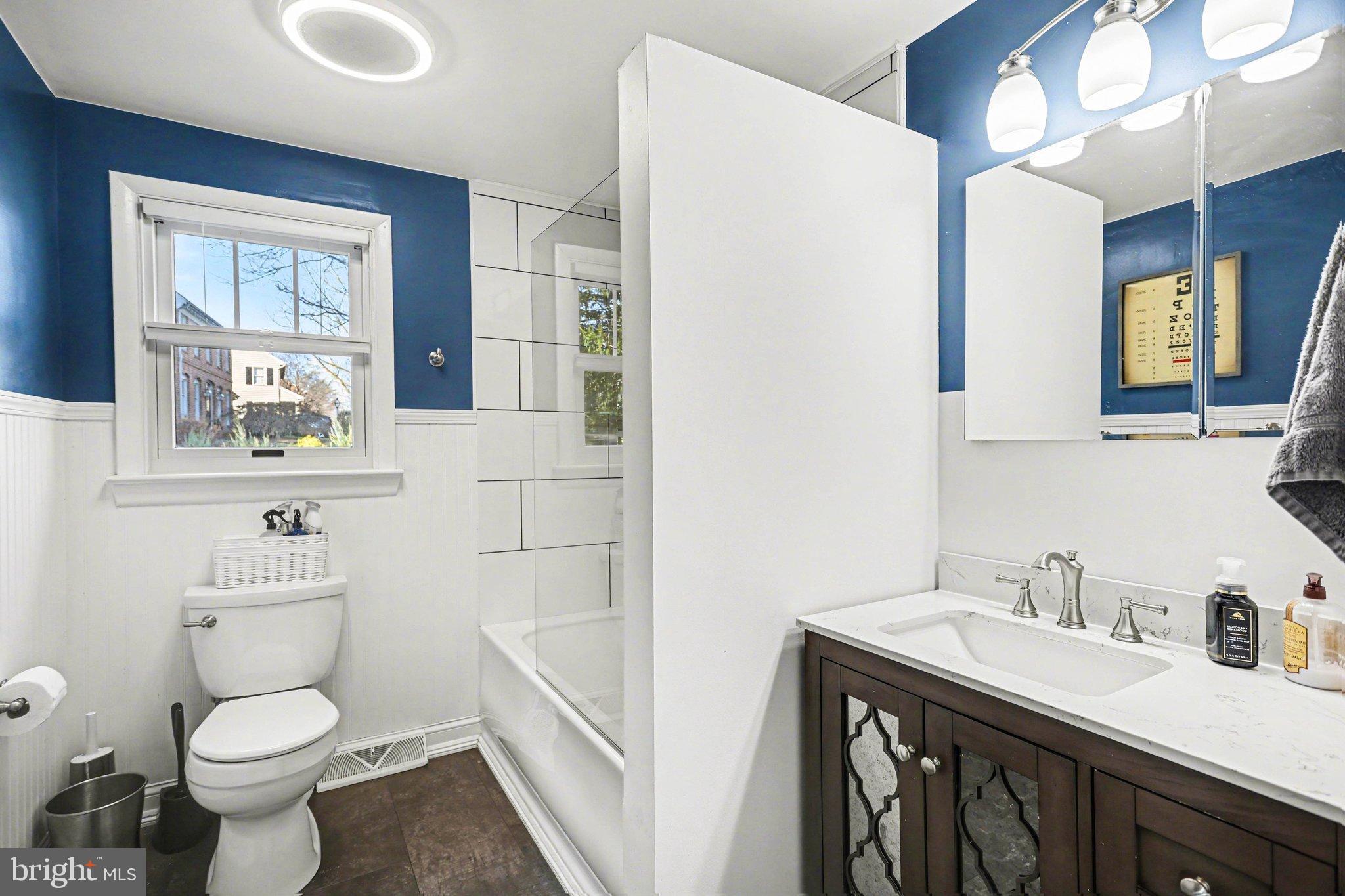 2848 Kissel Hill Road Lancaster, PA 17601 - Photo 10 of 36 a bathroom with a granite countertop toilet sink and mirror