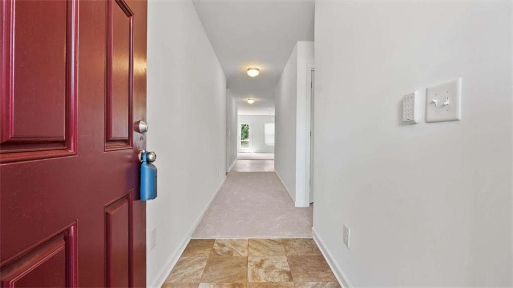 31 Southfork Drive Rome, GA 30165 - Photo 3 of 24 a view of a hallway with wooden walls