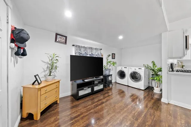 a very nice looking room with a white furniture
