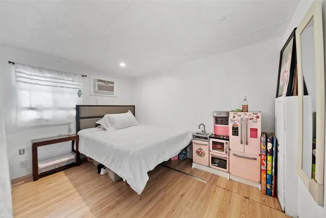 a bedroom with toys and a bed