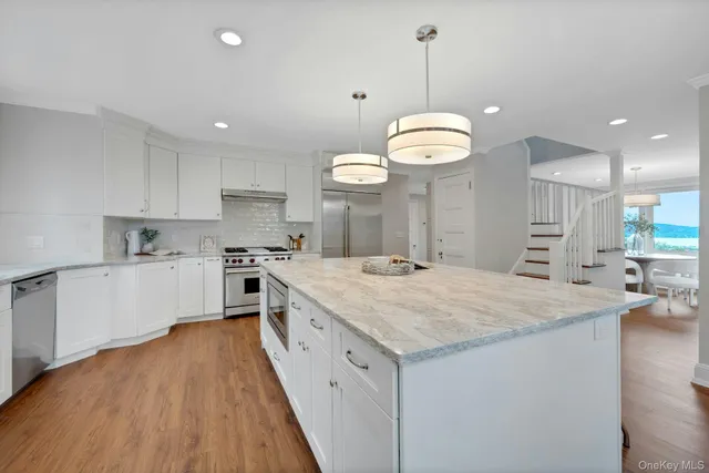 a bathroom with a sink a vanity and a mirror