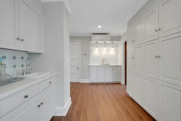 a bedroom with furniture and a fireplace