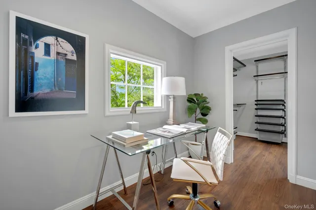 a spacious bedroom with a bed and a fireplace