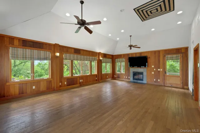 a room with two bed and a couch