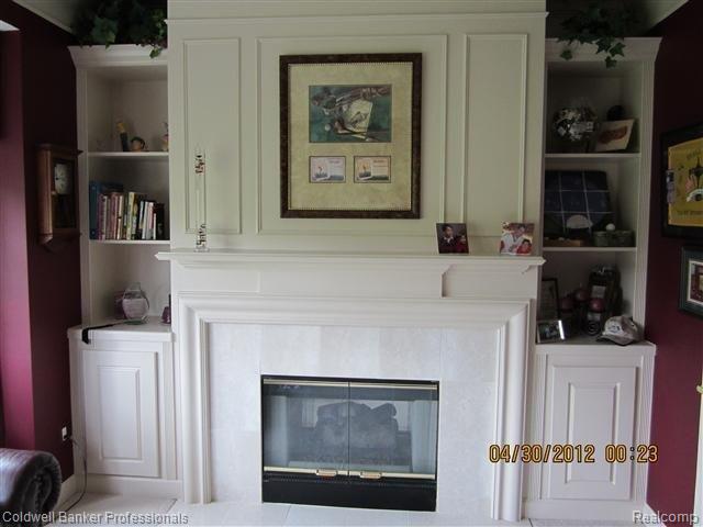 17185 Orchard Ridge Road Northville, MI 48168 - Photo 9 of 25 Office fireplace
