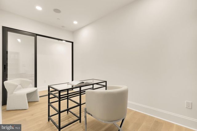 a kitchen with stainless steel appliances a refrigerator and sink