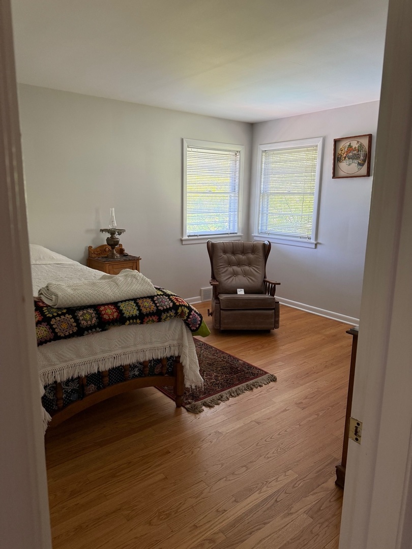 140 East Hillside Road Barrington, IL 60010 - Photo 12 of 17 a bedroom with a bed and a window