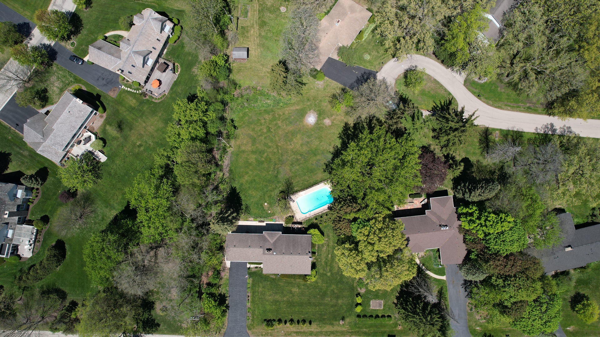 140 East Hillside Road Barrington, IL 60010 - Photo 3 of 17 an aerial view of a house with a yard and trees