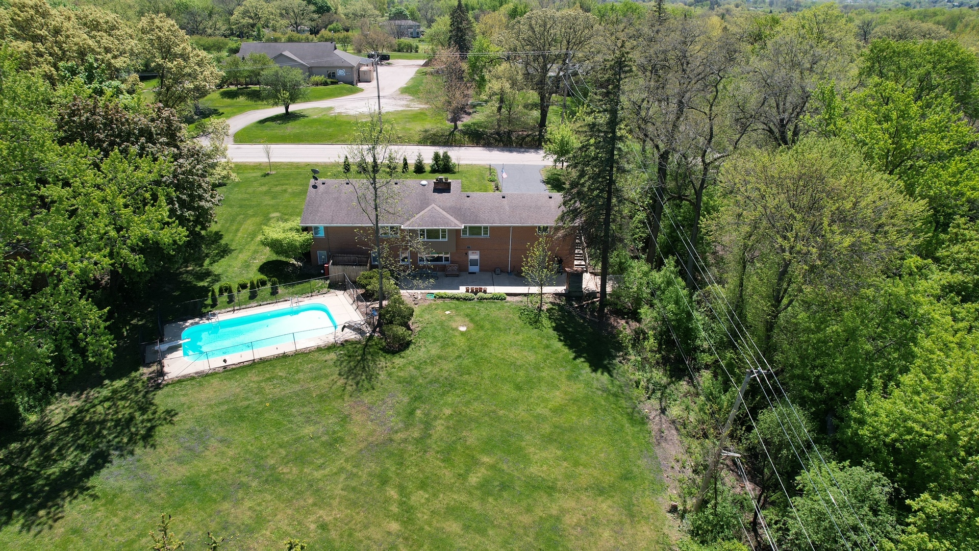 140 East Hillside Road Barrington, IL 60010 - Photo 5 of 17 an aerial view of a house with a yard and lake view