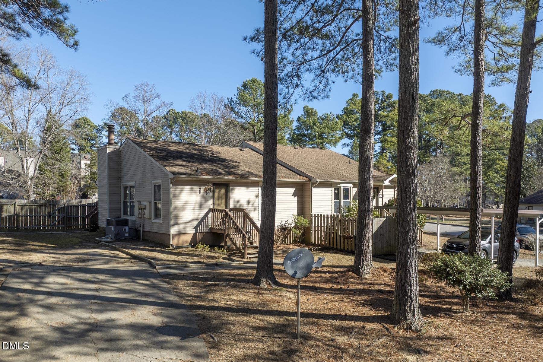 4 B Baytree Court Durham, NC 27705 - Photo 16 of 16 a view of a house with backyard