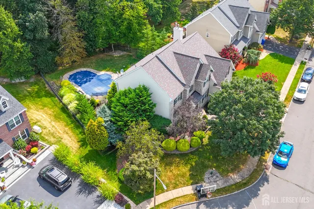 an aerial view of residential house with outdoor space
