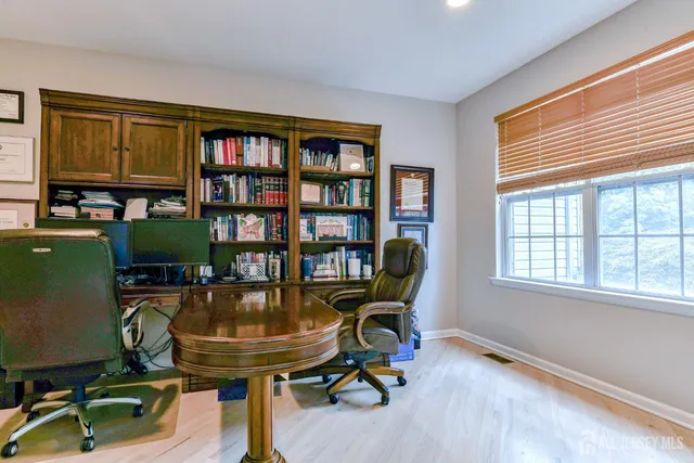 a room with furniture and a window