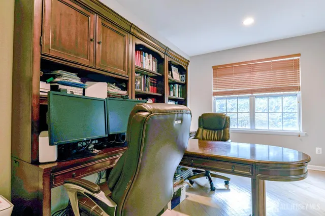 a bed room with furniture and a chandelier
