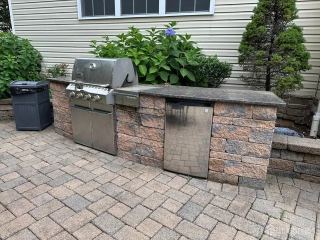 a view of an outdoor sitting area with furniture