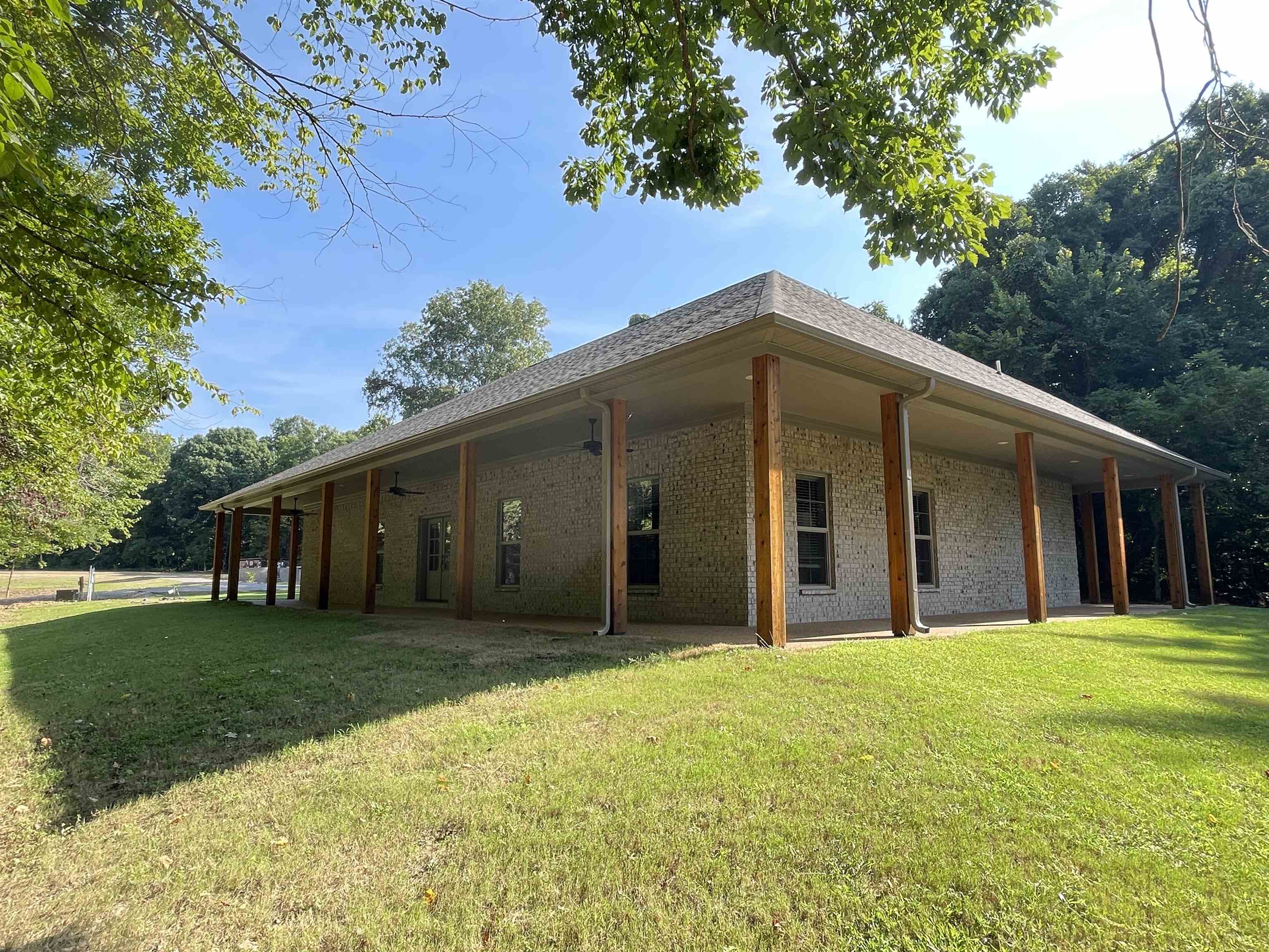 16691 Highway 59 Drummonds, TN 38023 - Photo 11 of 40 a view of a house with a yard