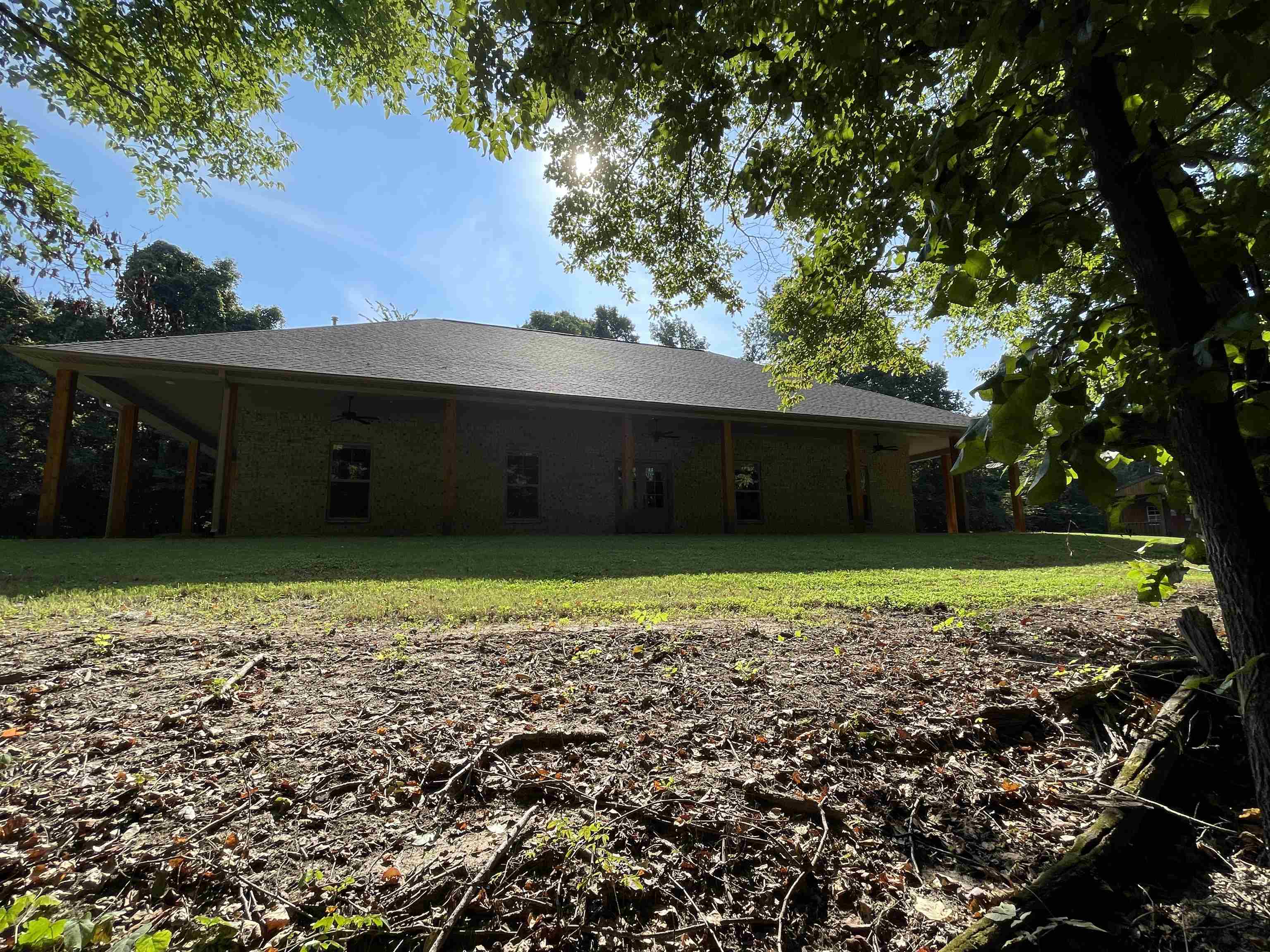 16691 Highway 59 Drummonds, TN 38023 - Photo 12 of 40 a view of a house with a garden