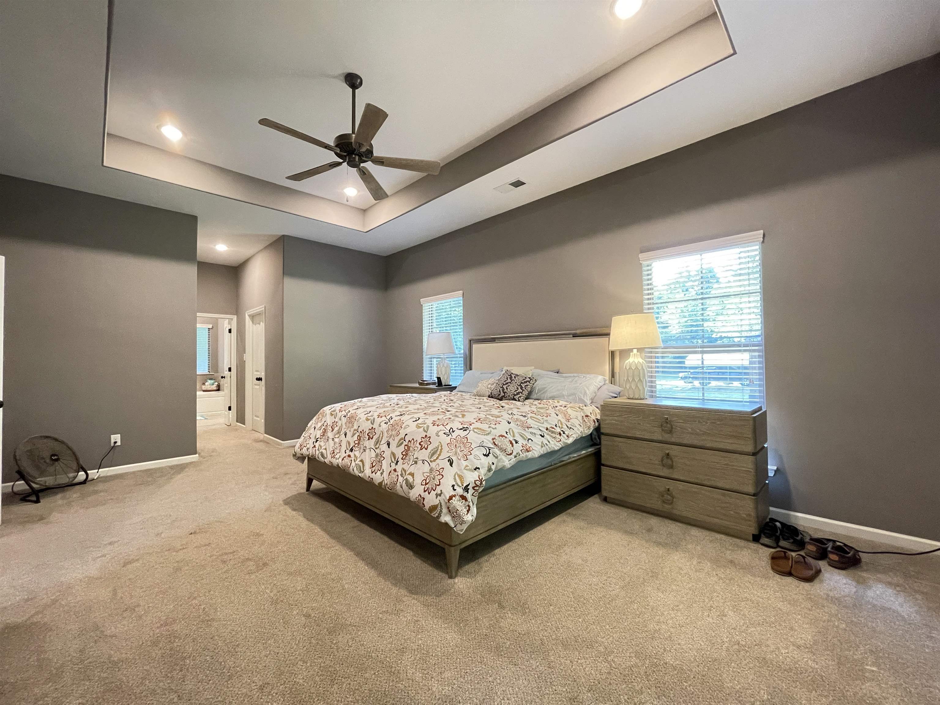 16691 Highway 59 Drummonds, TN 38023 - Photo 15 of 40 a bedroom with a bed and a ceiling fan