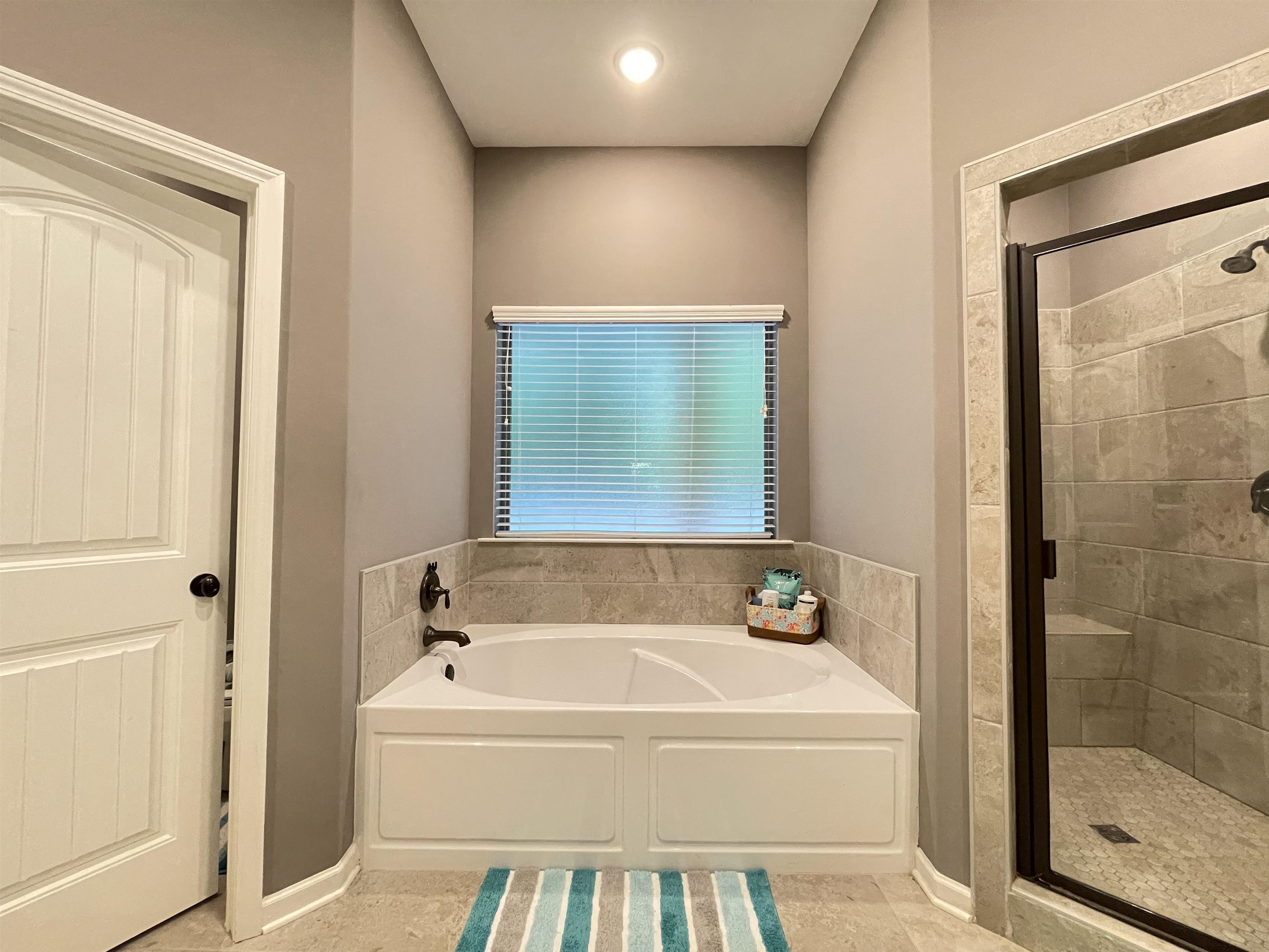 16691 Highway 59 Drummonds, TN 38023 - Photo 16 of 40 a white bath tub sitting next to a window