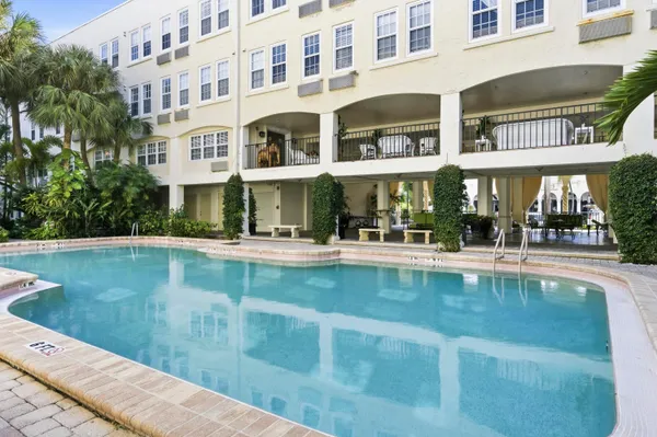 a view of a building with a swimming pool