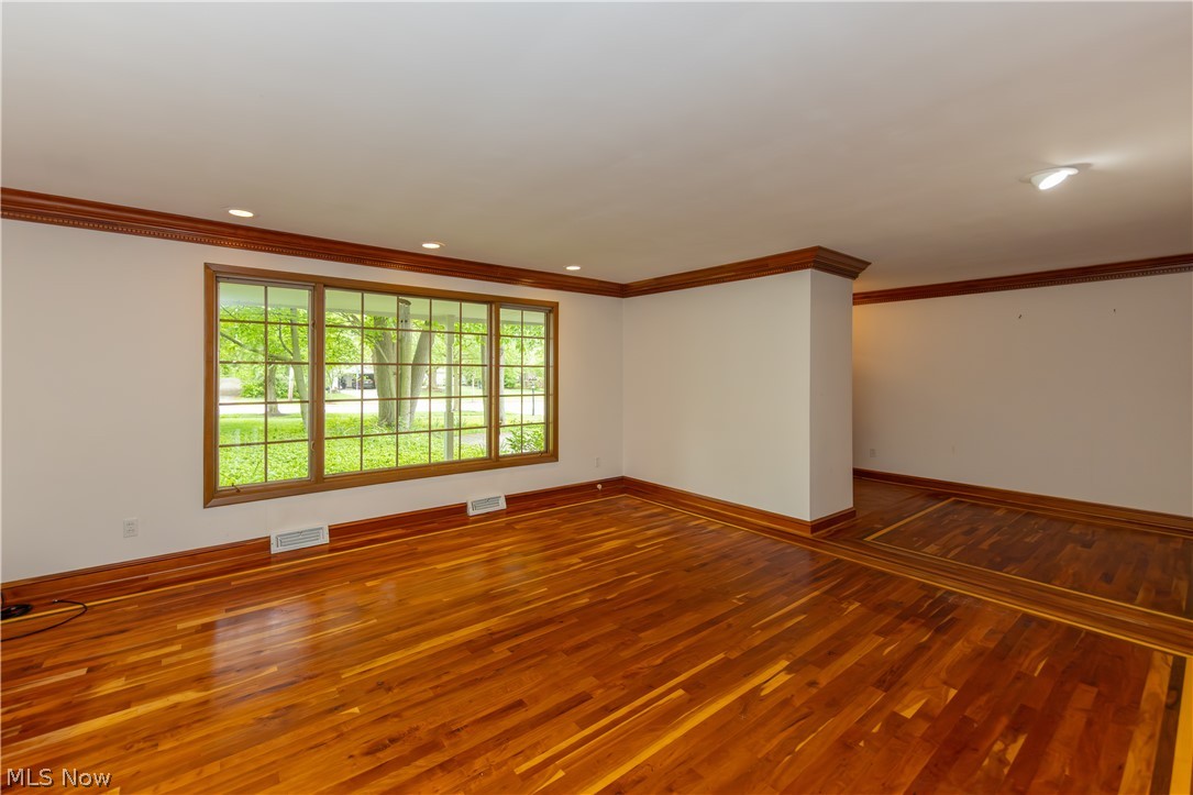 25001 Letchworth Road Beachwood, OH 44122 - Photo 5 of 50 Hardwood flooring throughout featuring an accent border