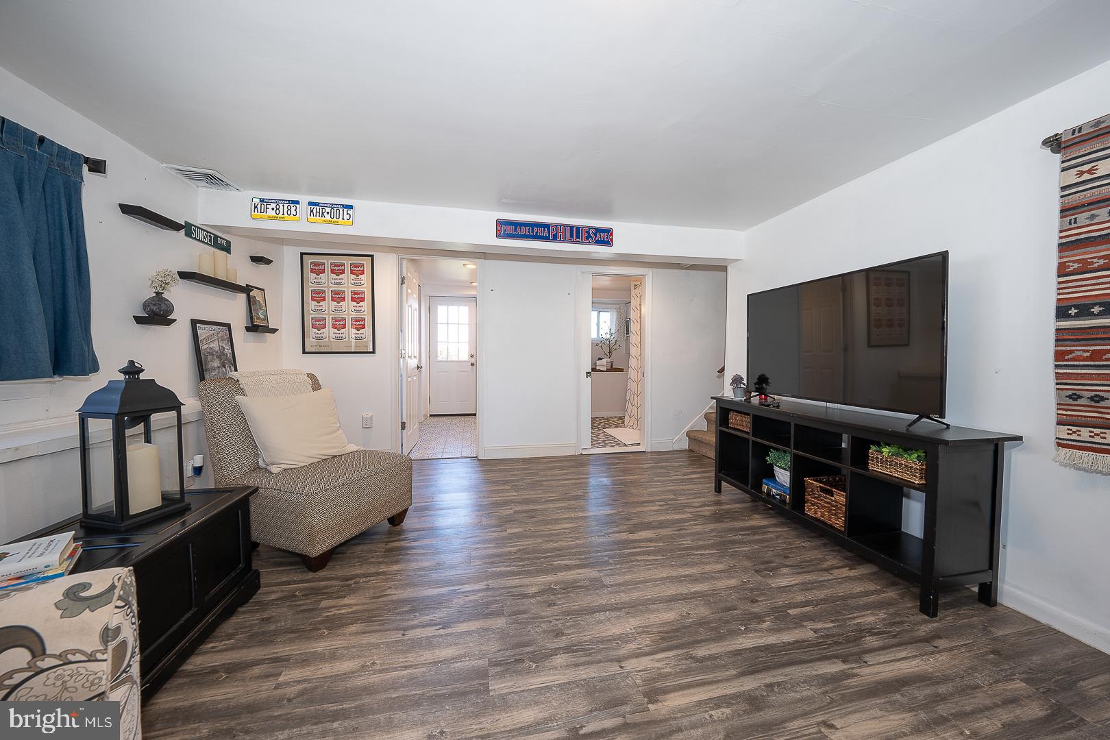 36 Sunset Drive Paoli, PA 19301 - Photo 28 of 69 a living room with furniture and a flat screen tv
