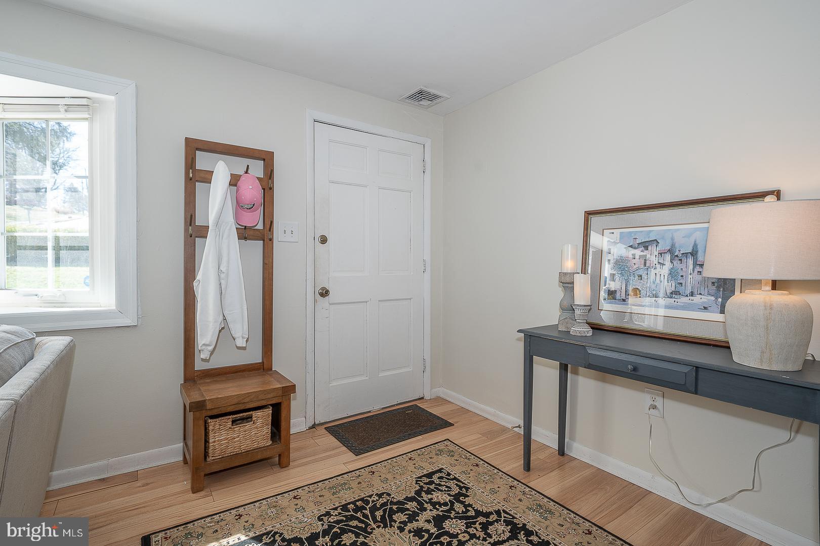 36 Sunset Drive Paoli, PA 19301 - Photo 5 of 69 a view of room with window and wooden floor