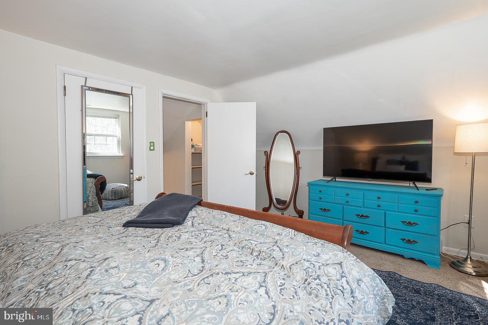 36 Sunset Drive Paoli, PA 19301 - Photo 51 of 69 a bedroom with a bed and a flat screen tv