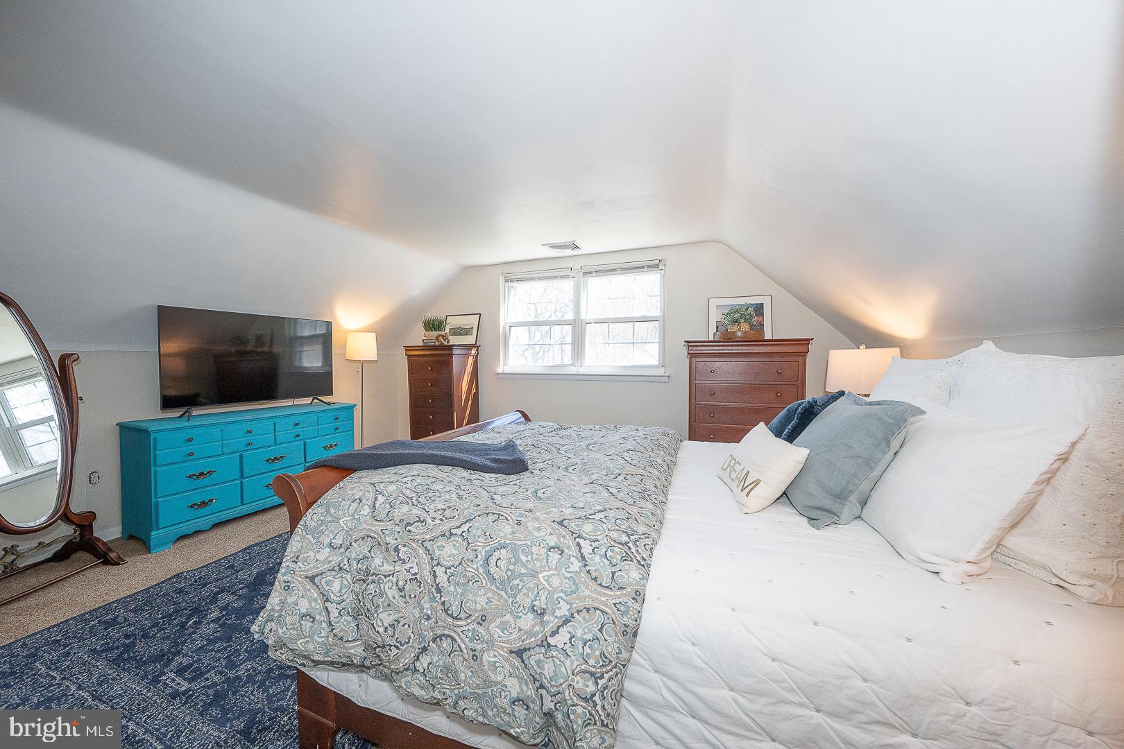 36 Sunset Drive Paoli, PA 19301 - Photo 55 of 69 a bedroom with a large bed and a flat screen tv