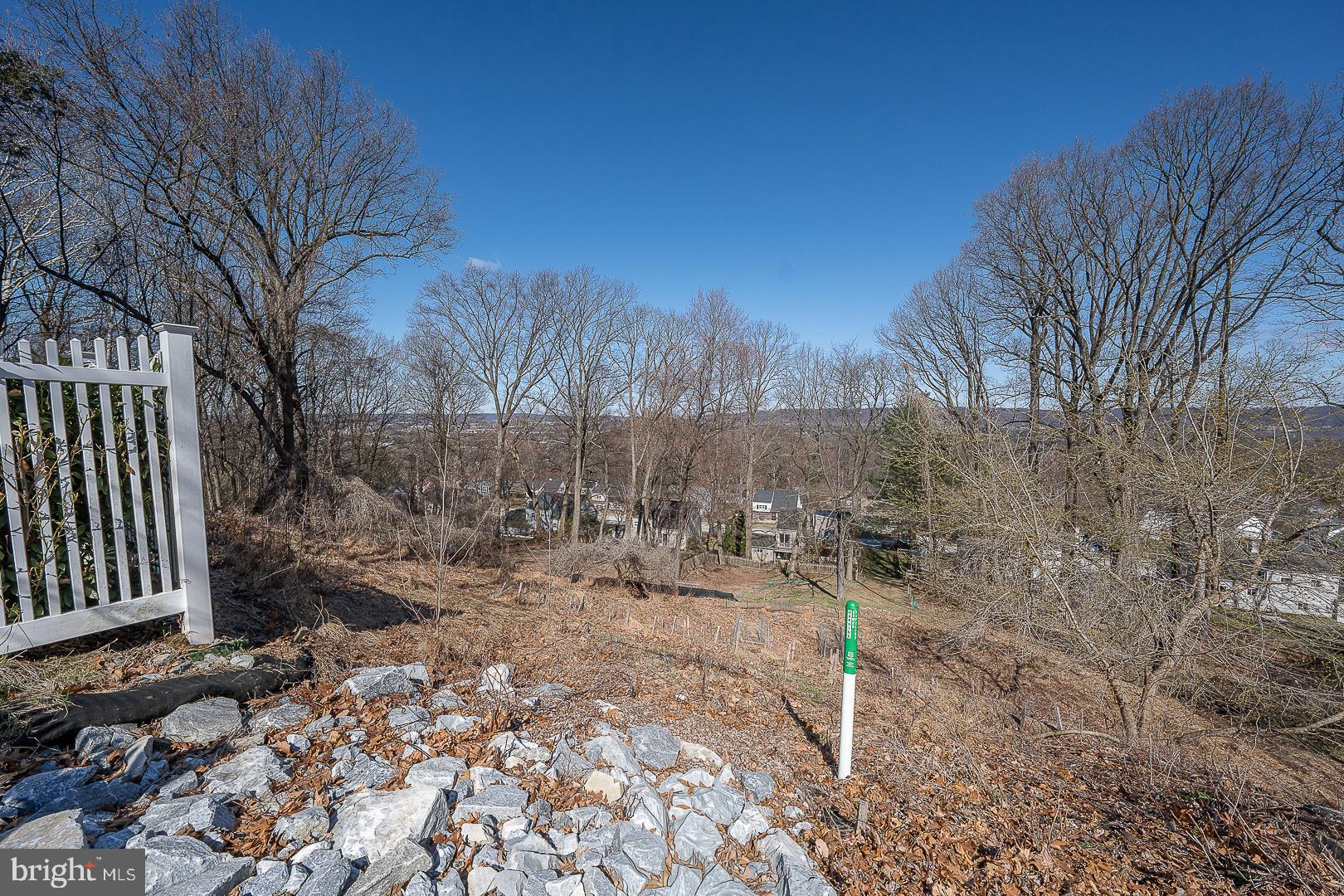 36 Sunset Drive Paoli, PA 19301 - Photo 65 of 69 a view of a yard with wooden fence