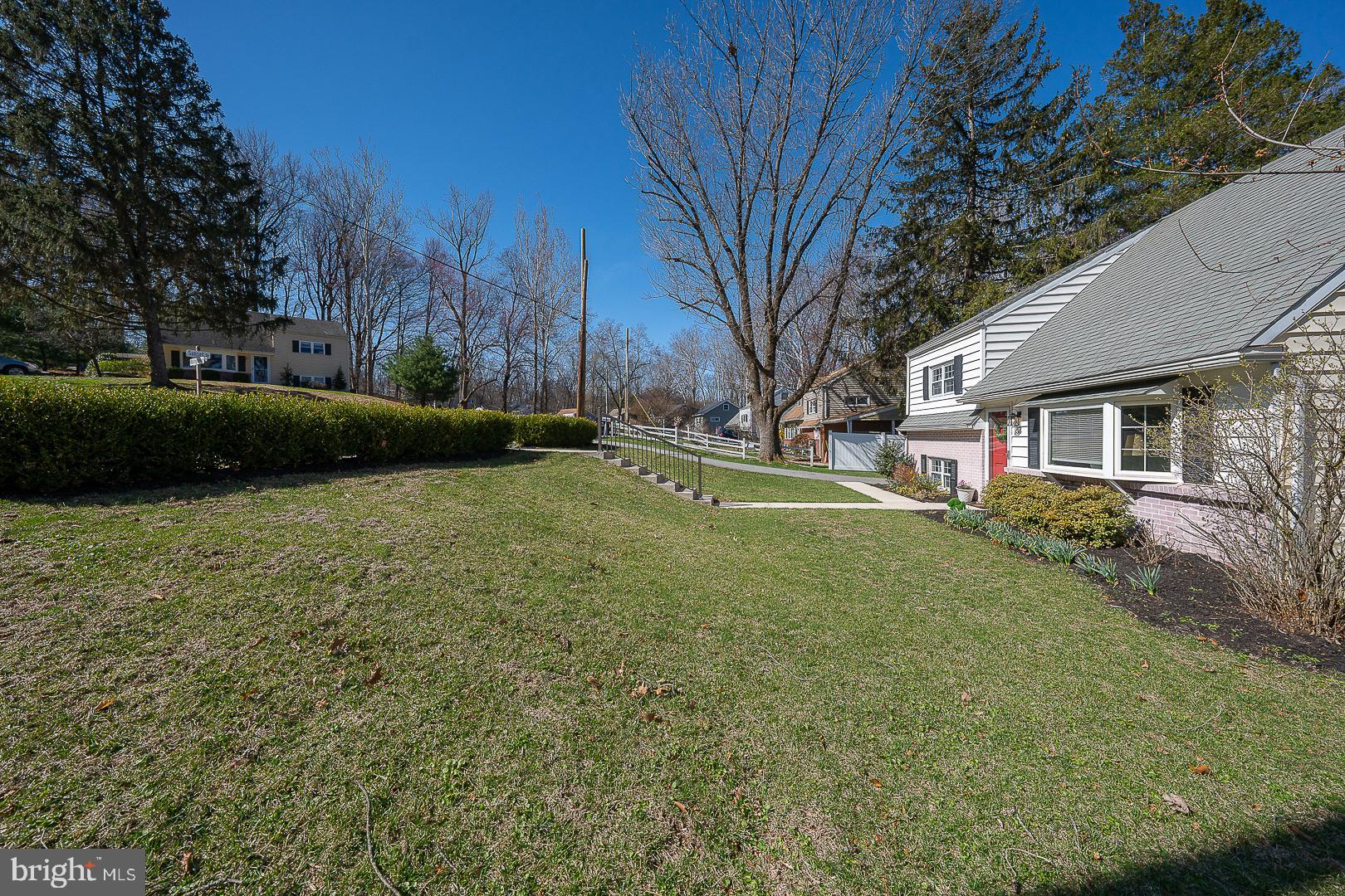 36 Sunset Drive Paoli, PA 19301 - Photo 68 of 69 a backyard of a house with lots of green space