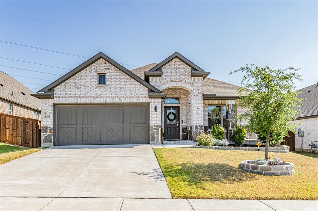 10269 Hanks Creek Road Fort Worth, TX 76126 - Photo 1 of 1 a front view of a house with a yard