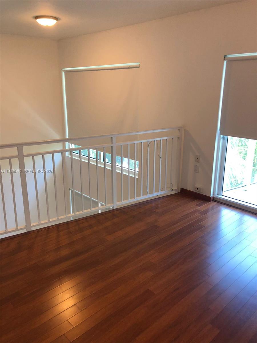 1650 Brickell Avenue, Unit 111 Miami, FL 33129 - Photo 19 of 23 a view of entryway with wooden floor