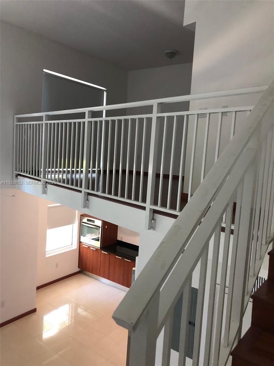 1650 Brickell Avenue, Unit 111 Miami, FL 33129 - Photo 23 of 23 a view of entryway with stairs