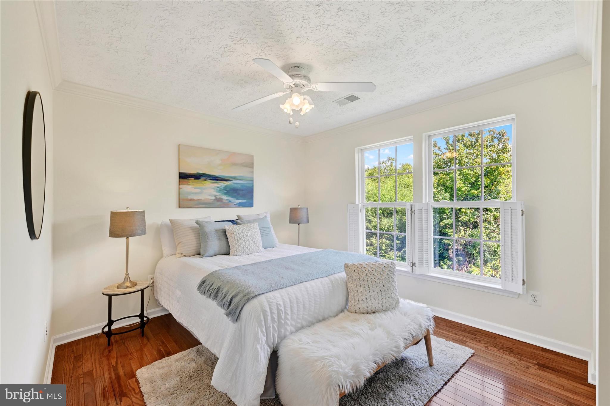 13 Brook Farm Court, Unit 13L Perry Hall, MD 21128 - Photo 18 of 31 a bedroom with a large bed and a window