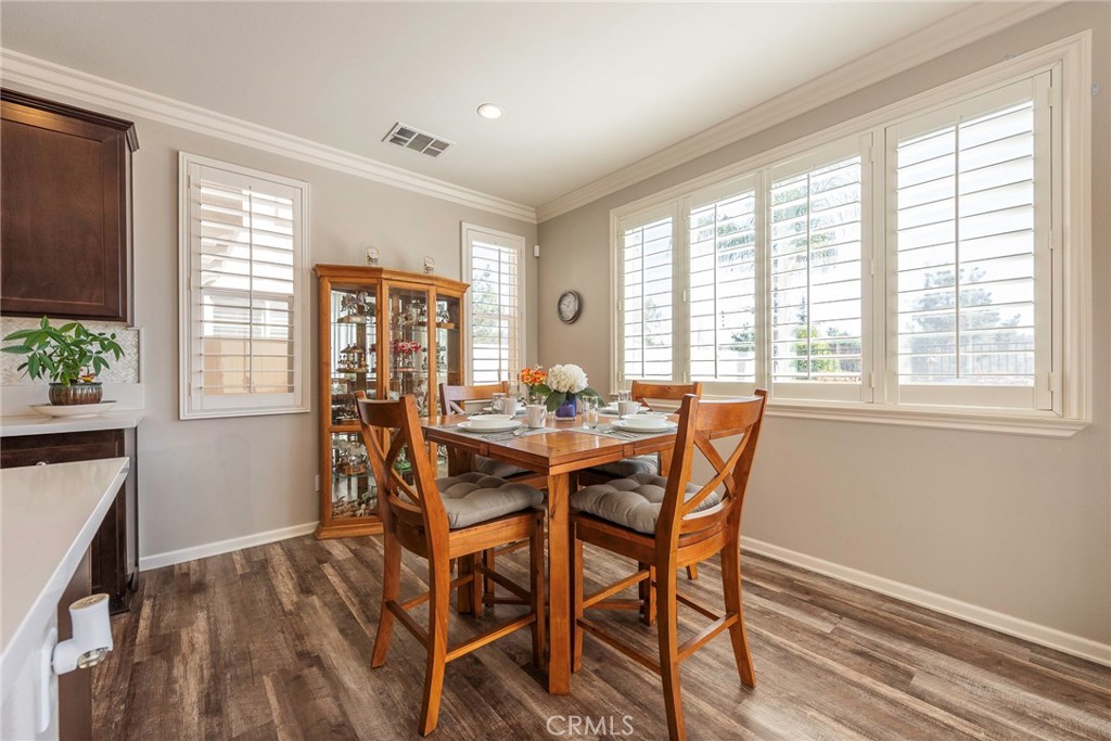 33837 Cansler Way Yucaipa, CA 92399 - Photo 12 of 49 a dining room with furniture and window